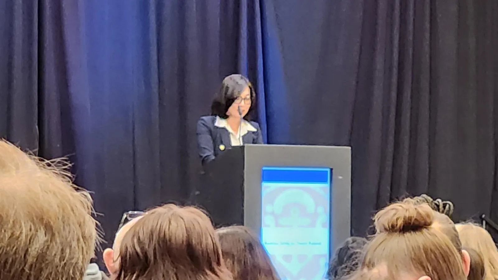 Esther Kim Lee speaking at ASTR