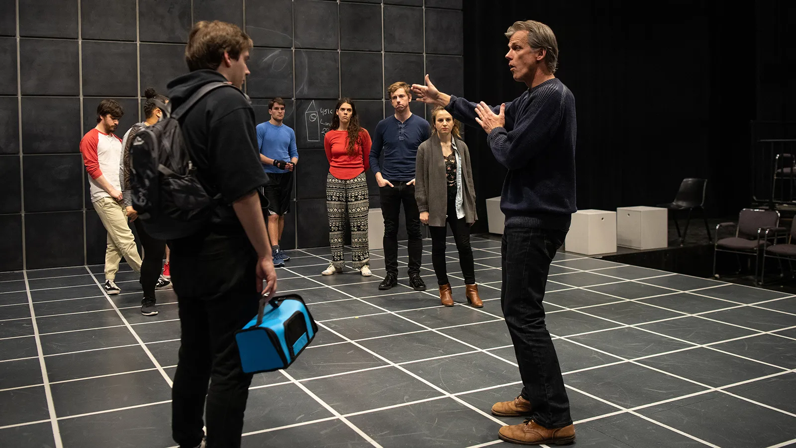 Director and actors in rehearesal