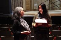 Assistant Professor Shilarna Stokes (left) confers with PhD student Yi-Ping Wu