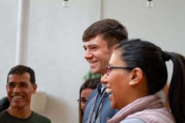 Candid shot of four people laughing