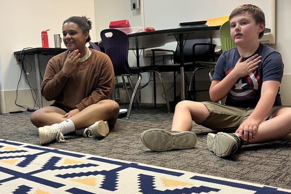 Hailee Franklin working with students at Bridgeway Academy