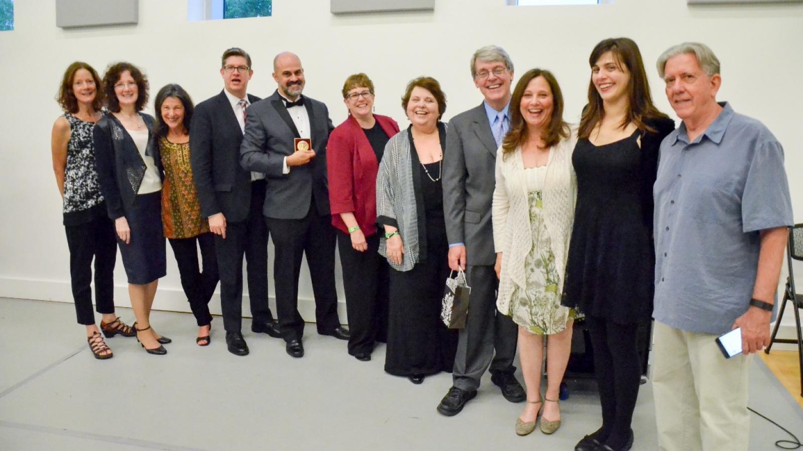 TRI representatives, members of the Margo Jones family and the Lawrence and Lee families with Ricky J. Martinez